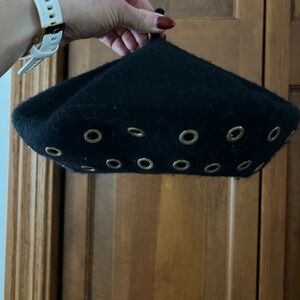 Chic Black Beret with Gold Eyelets